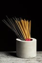 Many different aromatic incense sticks in grey vase Royalty Free Stock Photo