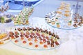 Many different canapes - cold appetizers are on Royalty Free Stock Photo