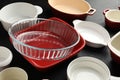 Many different casseroles on black table, closeup Royalty Free Stock Photo
