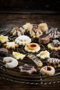 Christmas cookies on a cake rust on wooden background