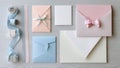 Many different colored envelopes and ribbons laid out on a table Royalty Free Stock Photo