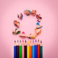 Many different colored pencils on pink background Royalty Free Stock Photo