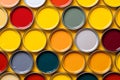 Many different colored tin cans with paint. House rennovation, design ideas, bright conceptual photo Royalty Free Stock Photo