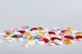 Many different colorful medication and pills perspective view. Set of many pills on colored background Royalty Free Stock Photo