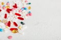 Many different colorful medication and pills perspective view. Set of many pills on colored background Royalty Free Stock Photo