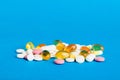 Many different colorful medication and pills perspective view. Set of many pills on colored background Royalty Free Stock Photo