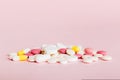 Many different colorful medication and pills perspective view. Set of many pills on colored background Royalty Free Stock Photo