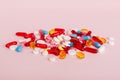 Many different colorful medication and pills perspective view. Set of many pills on colored background Royalty Free Stock Photo