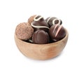 Many different delicious chocolate truffles in bowl on white background Royalty Free Stock Photo
