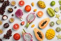 Many different delicious exotic fruits on light background, flat lay Royalty Free Stock Photo