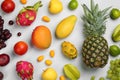 Many different delicious exotic fruits on light background, flat lay Royalty Free Stock Photo