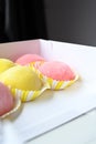 Many different delicious mochi in box, closeup. Traditional Japanese dessert side view