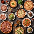 many different dishes standing next to each other shot from above. include pizza, lasagne, steak, burger - 1