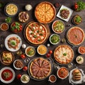 many different dishes standing next to each other shot from above. include pizza, lasagne, steak, burger - 1