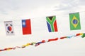 Many different flags against sky