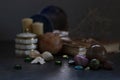 Many different gemstones on the blurred mirrors and  candles background Royalty Free Stock Photo