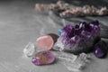 Many different gemstones on marble table Royalty Free Stock Photo