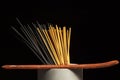 Many different incense sticks with wooden stand Royalty Free Stock Photo