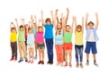 Many different kids with raised in the air hands Royalty Free Stock Photo