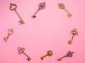 Many different old keys from different locks, scattered chaotically, flat lay.