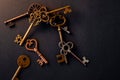 Many different old keys from different locks, scattered chaotically, Royalty Free Stock Photo