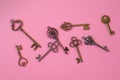 Many different old keys from different locks, scattered chaotically, flat lay. Royalty Free Stock Photo