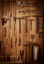 Many different old tools hanging on wall Royalty Free Stock Photo