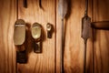 Many different old tools hanging on wall