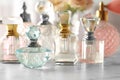 Many different perfume bottles on table Royalty Free Stock Photo