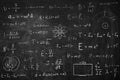 Many different physics formulas written on blackboard Royalty Free Stock Photo