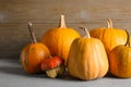 Many different ripe pumpkins on table Royalty Free Stock Photo
