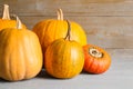 Many different ripe pumpkins on table Royalty Free Stock Photo