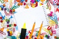 Many different school supplies and empty notepad white sheet of paper. Back to school concept Royalty Free Stock Photo