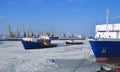 Many different ships in the port in the winter. Royalty Free Stock Photo