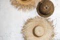 Many different straw hats on white background Royalty Free Stock Photo