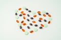 Many different tablet pills on white background, flat lay, with copy space Royalty Free Stock Photo