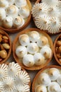 Many different tartlets on grey table, flat lay. Delicious dessert