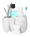 Many different teeth care products and dental tools on white background Royalty Free Stock Photo