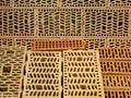 Many different types of construction hollow bricks with patterns inside. samples for sale at diy store warehouse depot Royalty Free Stock Photo