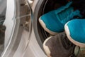 Many dityr Pairs Of Sneakers In The drum Washing Machine Royalty Free Stock Photo