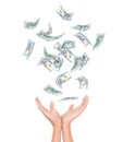 Many dollars falling on womans hand Royalty Free Stock Photo