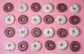 Donuts on pink background, pattern