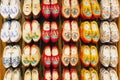 Many dutch traditional wooden shoes or clogs for sale in souvenir shop in Holland Royalty Free Stock Photo