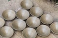 Many earthen pots or clay pots are kept for drying in the sun in the workshop