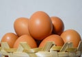 Many eggs in a small bamboo basket on the gray wooden floor, Chicken eggs contain protein and many other nutrients, all of which Royalty Free Stock Photo