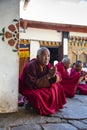 Bhutanese monk put his palms together and pray , Bhutan