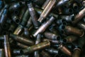 Many empty bullet shells, pile of used rifle cartridges 7.62 mm caliber, assault rifle bullet shell, military background, top view Royalty Free Stock Photo