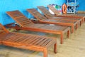 Many empty chaise-longues Royalty Free Stock Photo