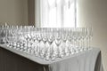 Many empty clean glasses for guests at the buffet festive wedding table Royalty Free Stock Photo