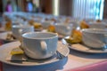 Many empty cup on saucer with spoon, non-dairy creamer and sugar Royalty Free Stock Photo